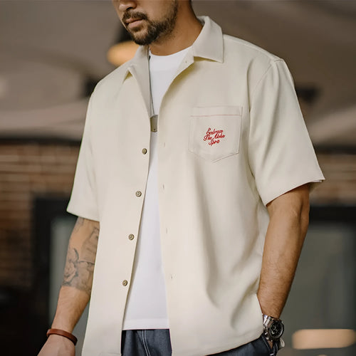 Light apricot bamboo pattern Cuban collar shirt for men with plant and flower designs