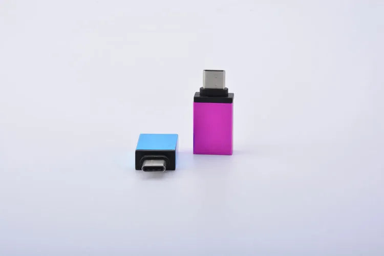 Metal Type-C mobile phone adapter in gold colour with universal connectivity
