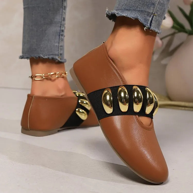 Brown artificial PU flat loafers for women with metal buckle and round toe, side view