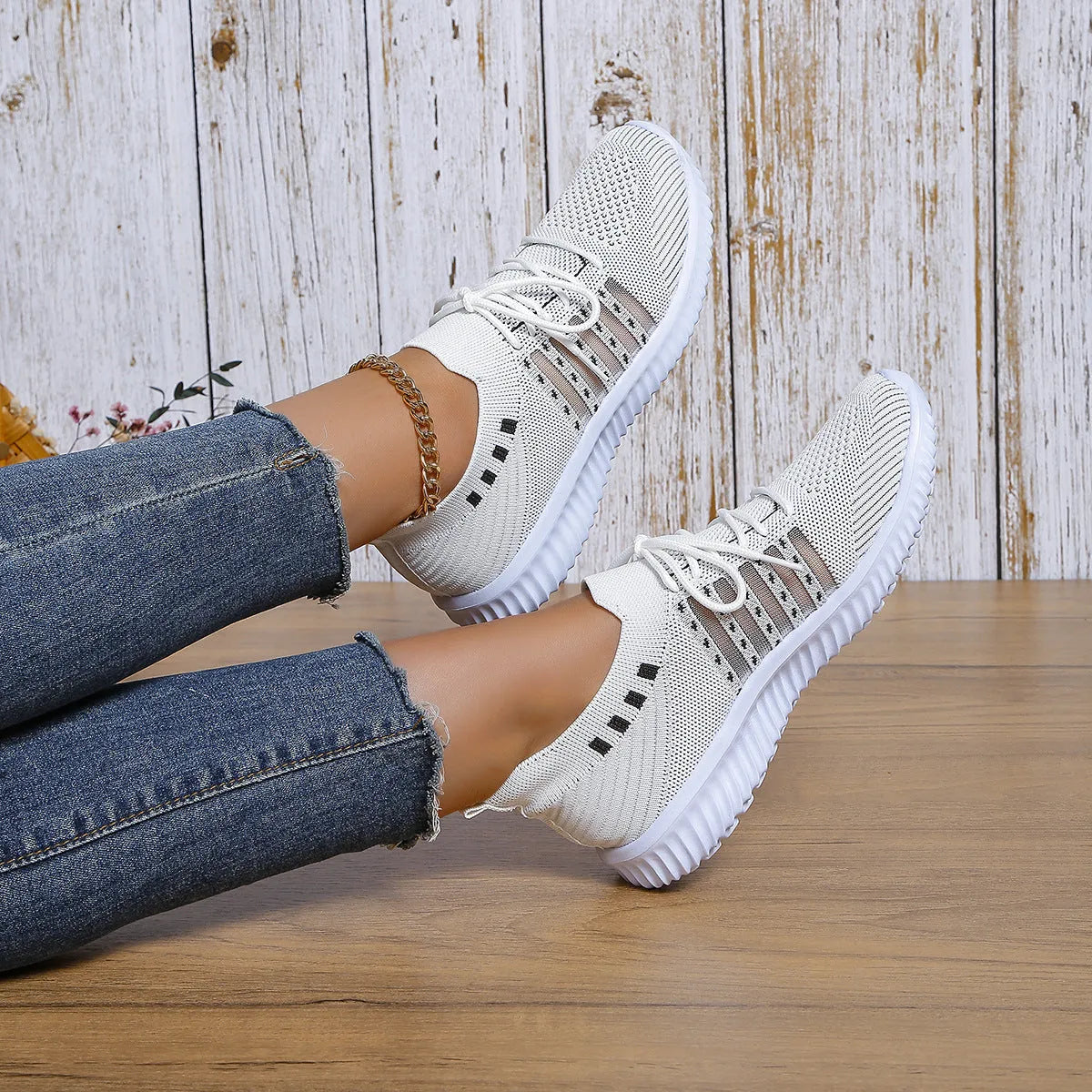 Beige lace-up mesh sneakers with round toe, rubber sole, and PU insole on a flat surface