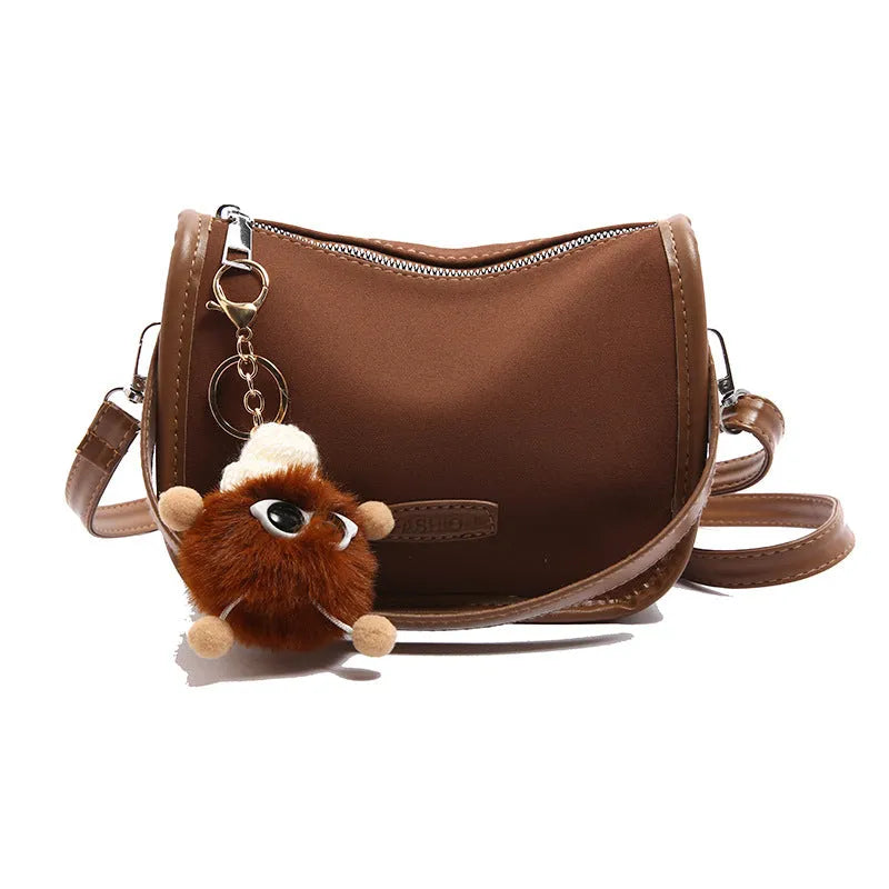 Fashion textured PU messenger bag for women in leopard print with cross-body strap and pendant