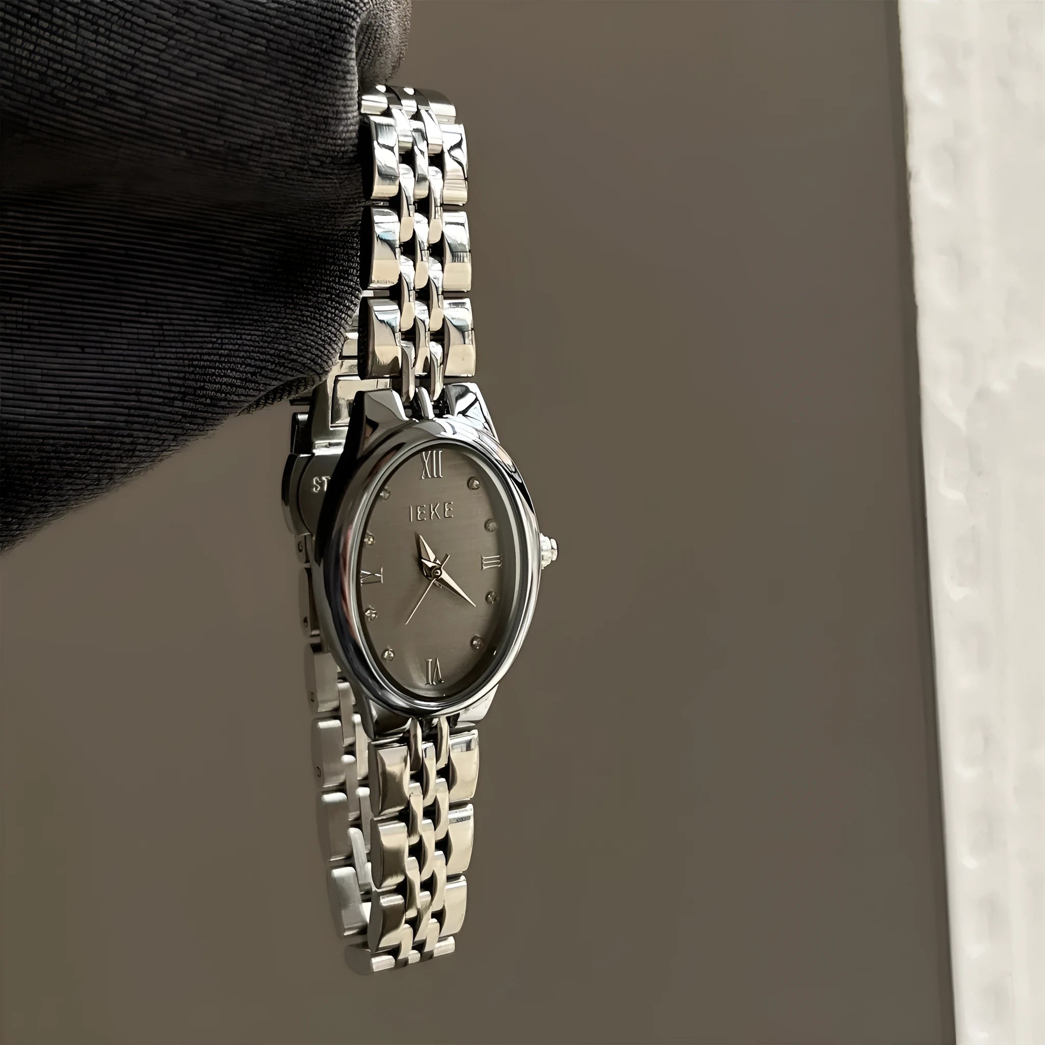 Oval dial ladies watch with dot markers, 37mm, gold strap and gold face