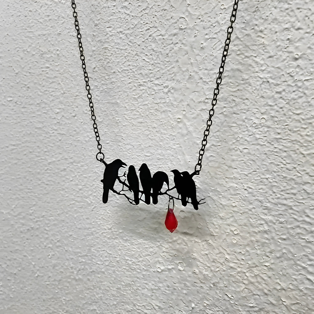 Black crow bird design necklace with electroplated finish on cross chain
