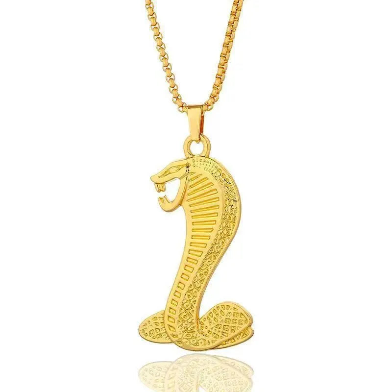 Gold geometric alloy pendant necklace with inlaid diamond-treated zirconia stones.