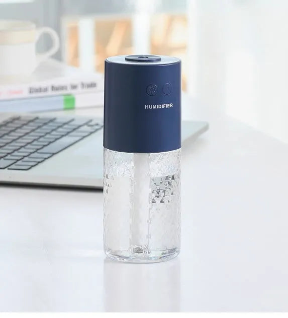 Wireless humidifier and projection lamp, mini portable USB car mist diffuser with 1 litre tank.