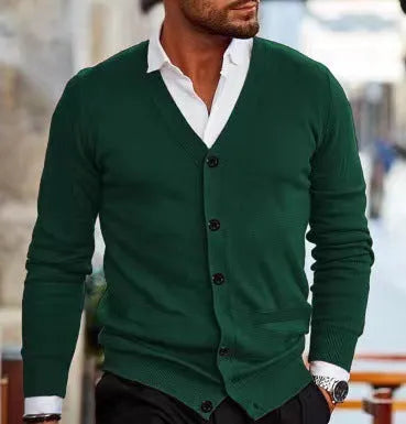 A man wearing a slim-fit, long-sleeve acrylic cardigan sweater coat in a dark green colour.