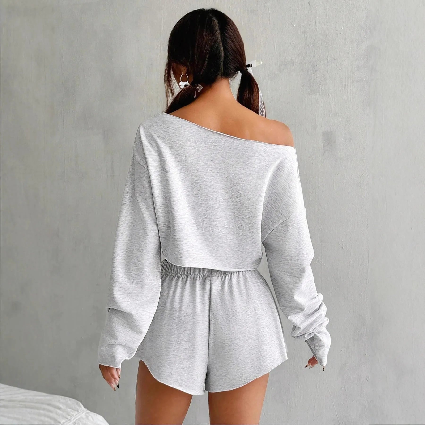 Women's gray cotton long-sleeve blouse and shorts suit set on flat lay
