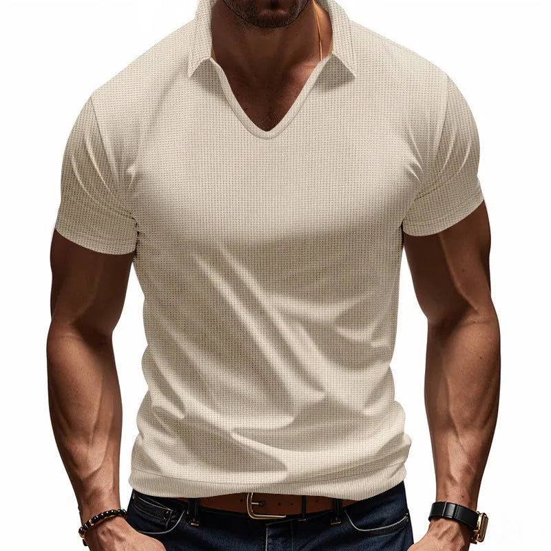 Men's loose fit light grey cotton blend V-neck short sleeve t-shirt laid flat.