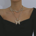 Butterfly-shaped alloy pendant necklace with rhinestone accents, gold electroplated finish
