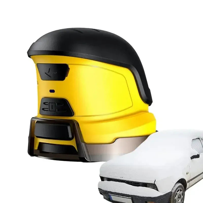 Yellow cordless electric car ice scraper with USB charging cable on a frosty car windscreen.