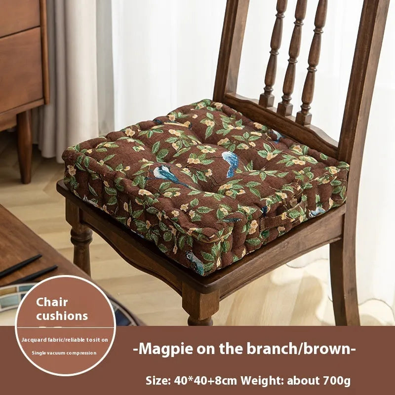 American-style square dining chair cushion with thick padding and botanical print.