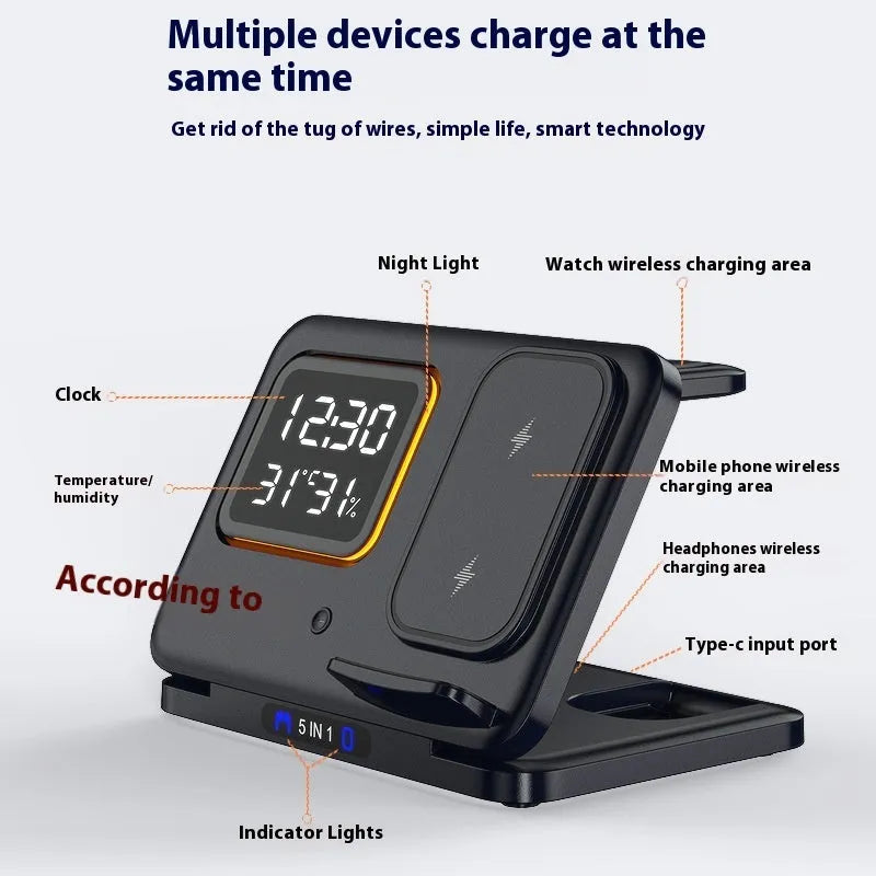 Black wireless charging station with digital display showing time and temperature, charging phone and watch