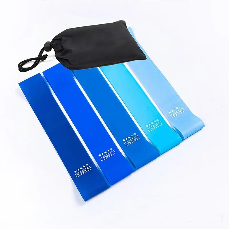 Set of five coloured yoga tension straps showing different resistance levels for fitness training