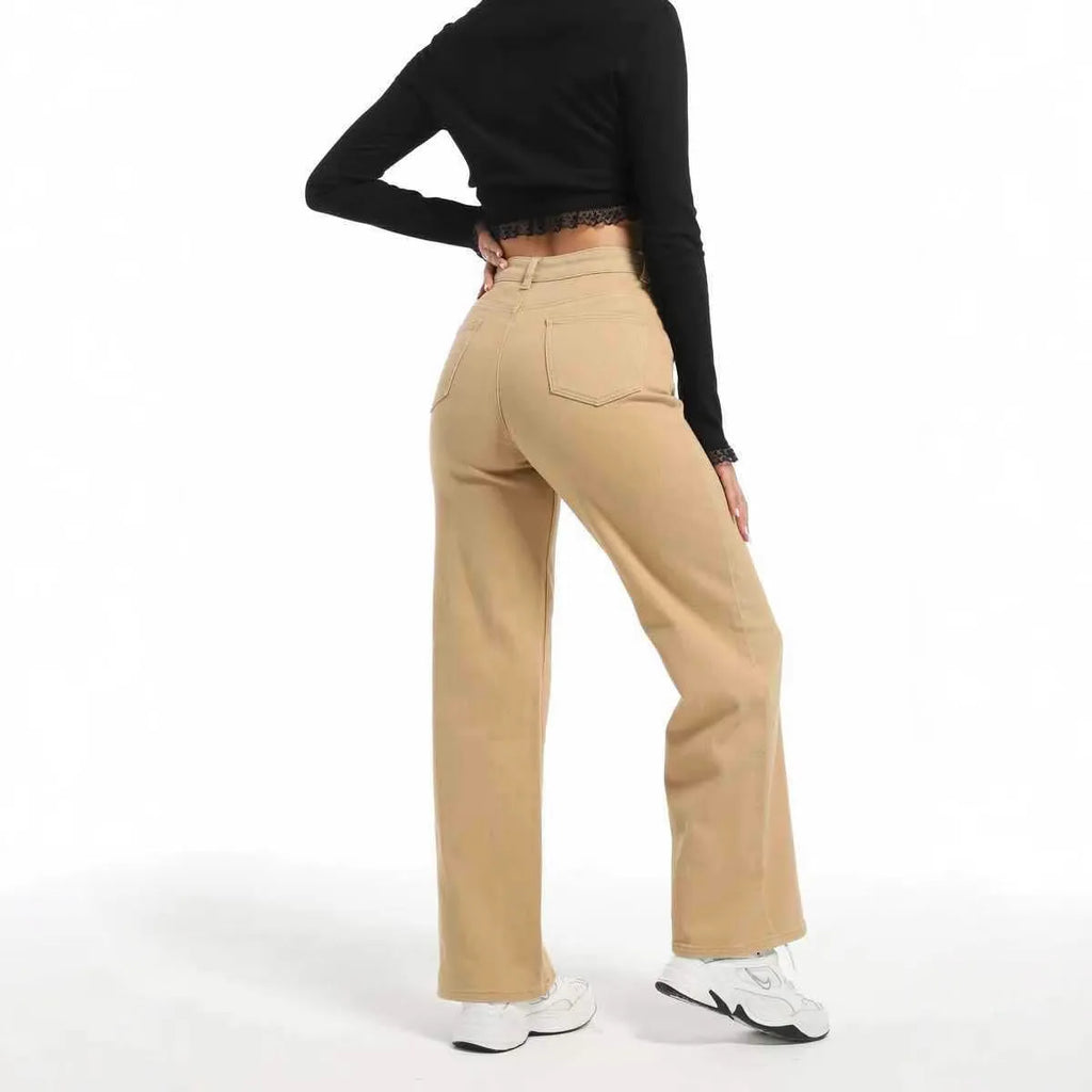 Women's high-waisted wide-leg straight jeans in apricot colour on a model.