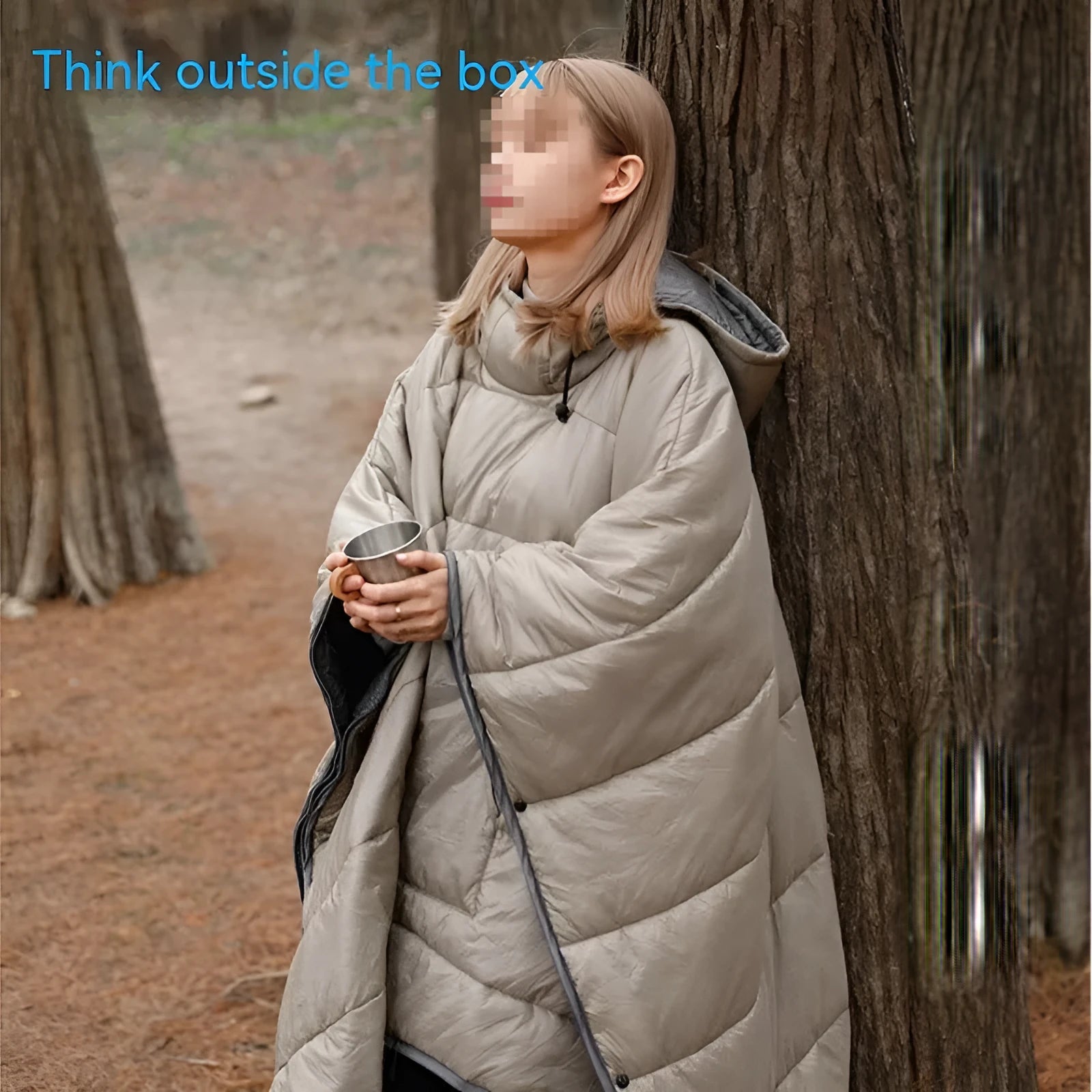 Outdoor cloak sleeping bag in grey or army green, showing wearable cape configuration and flat blanket layout