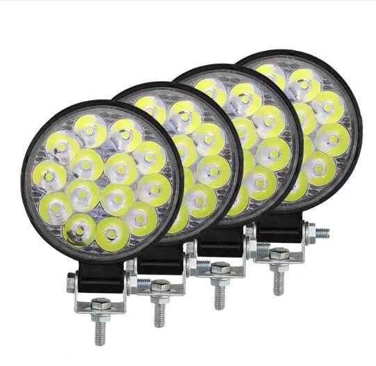 White aluminium LED work light unit with IP67 waterproof rating, suitable for car and off-road vehicle mounting.