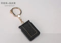 Bluetooth dual SIM adapter keychain for iOS devices with NANO SIM slot and USB charging port