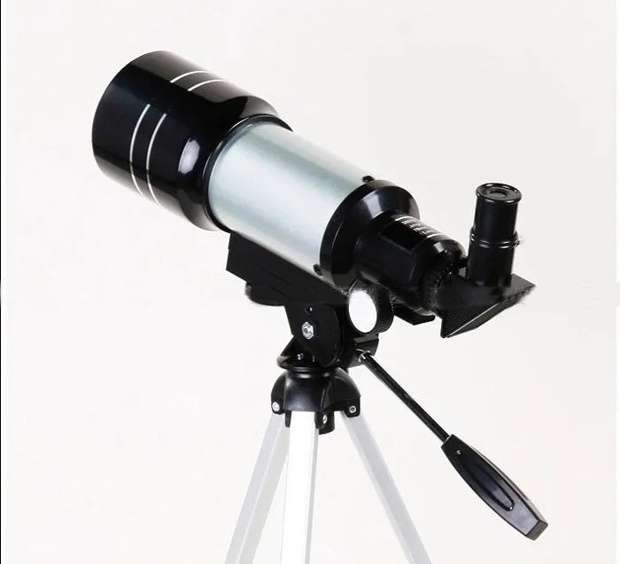 Silver F30070M telescope with 70mm aperture on its 38cm tripod, two eyepieces and moon mirror included