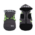 Red fleece-lined waterproof dog jacket with hood on a medium-sized dog during winter