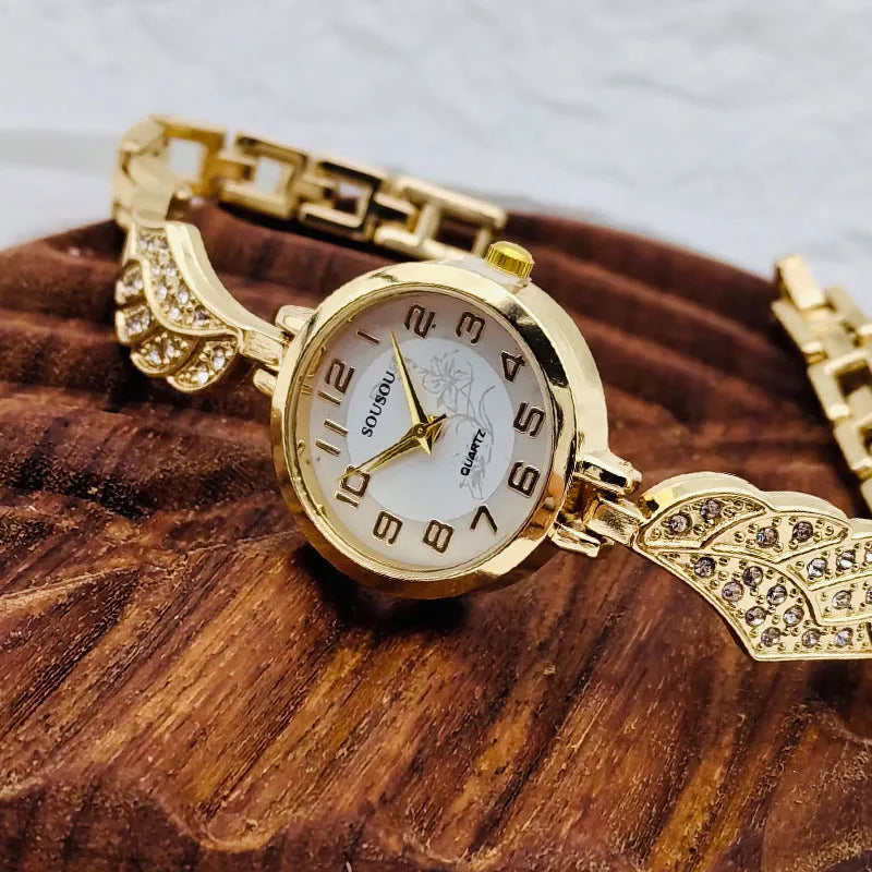 Stainless steel women's watch with round dial and vachette clasp in gold colour option