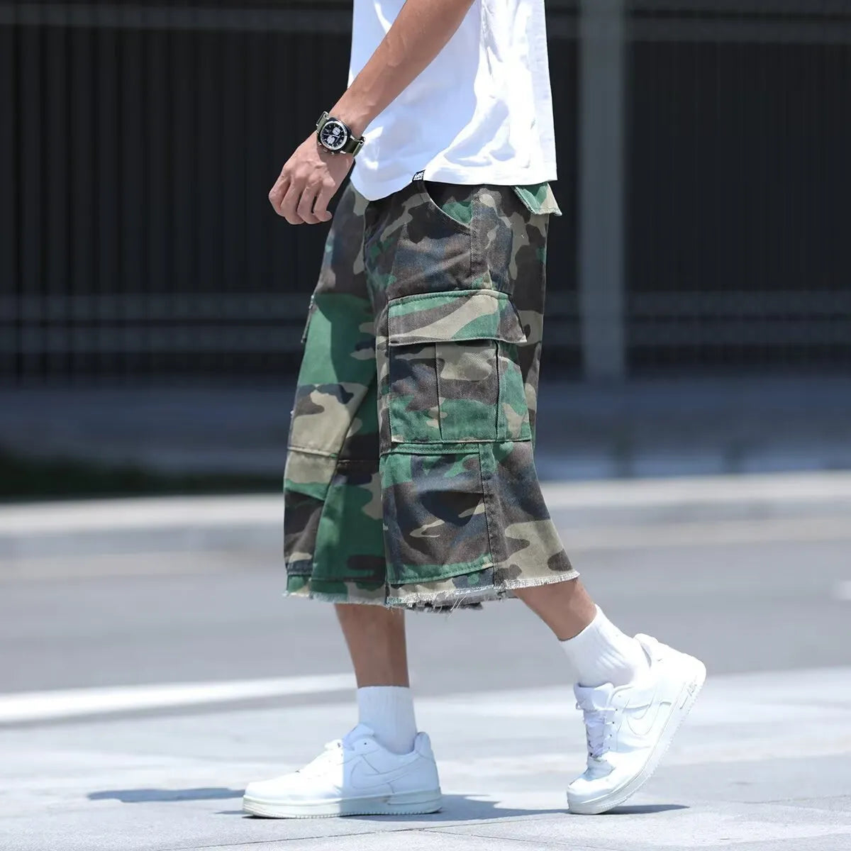 American retro workwear shorts in camouflage pattern with cotton construction and loose fit design