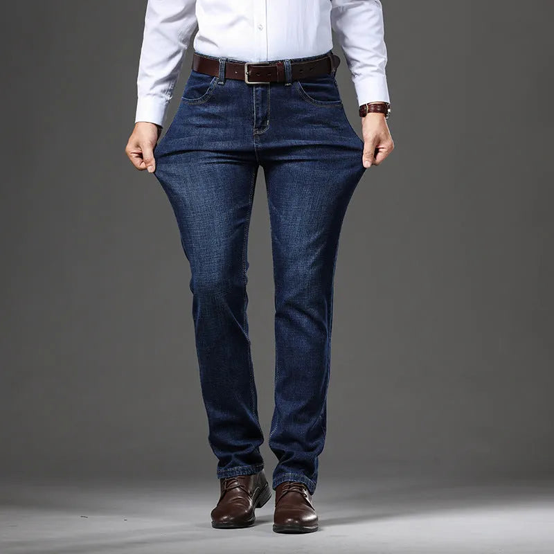 Loose fit straight-leg stretch jeans in black and blue denim colours on a hanger