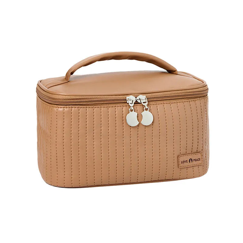 Open-top women's makeup bag in PU leather, shown in a choice of solid colours including pink, beige, and light blue.