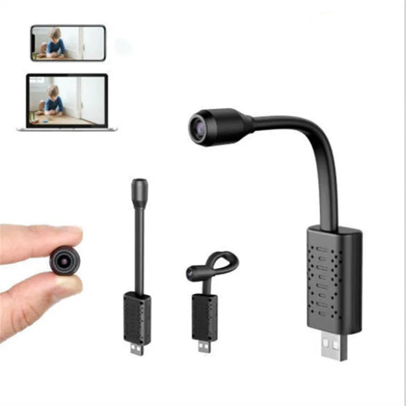 Black V380 wireless USB camera on a stand next to a microSD card and mobile power bank