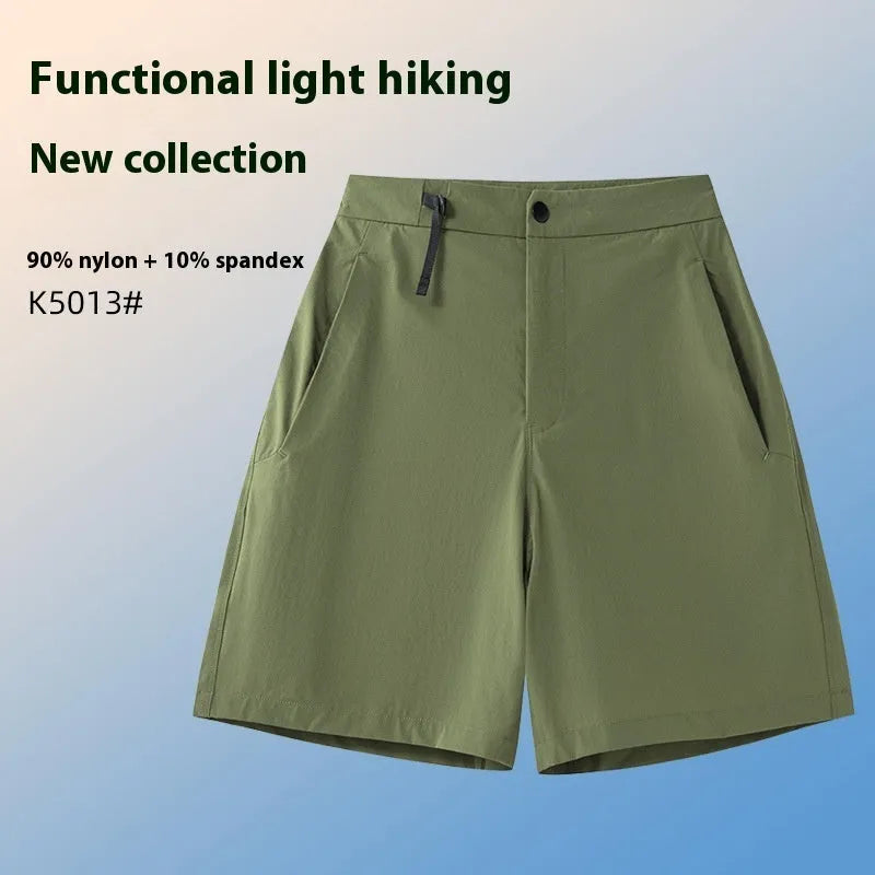 Man wearing khaki 3D cut sports shorts with four-way stretch fabric during a run.