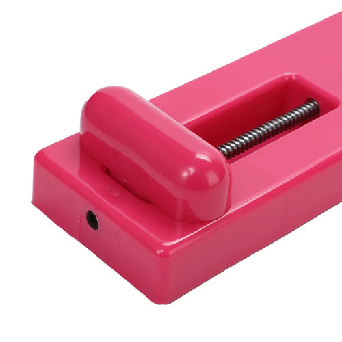 Pink and white flexible ballet foot trainer for rotation shaping and instep muscle exercise.