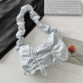 Women's soft polyester pleated flip shoulder bag with bow detail in blue plaid colour