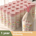 Pink drawstring degradable garbage bags with wormwood, shown in a pack, dimensions 44cm by 48cm.