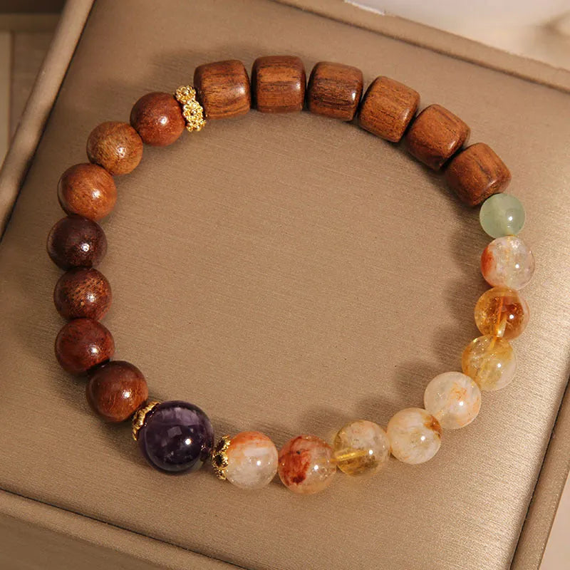 Yellow tower crystal and ebony amethyst women's bracelet with rhinestone details.