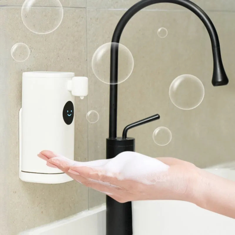 White Smile automatic hand washing machine with intelligent induction sensor mounted on a wall showing foam dispensed into a hand