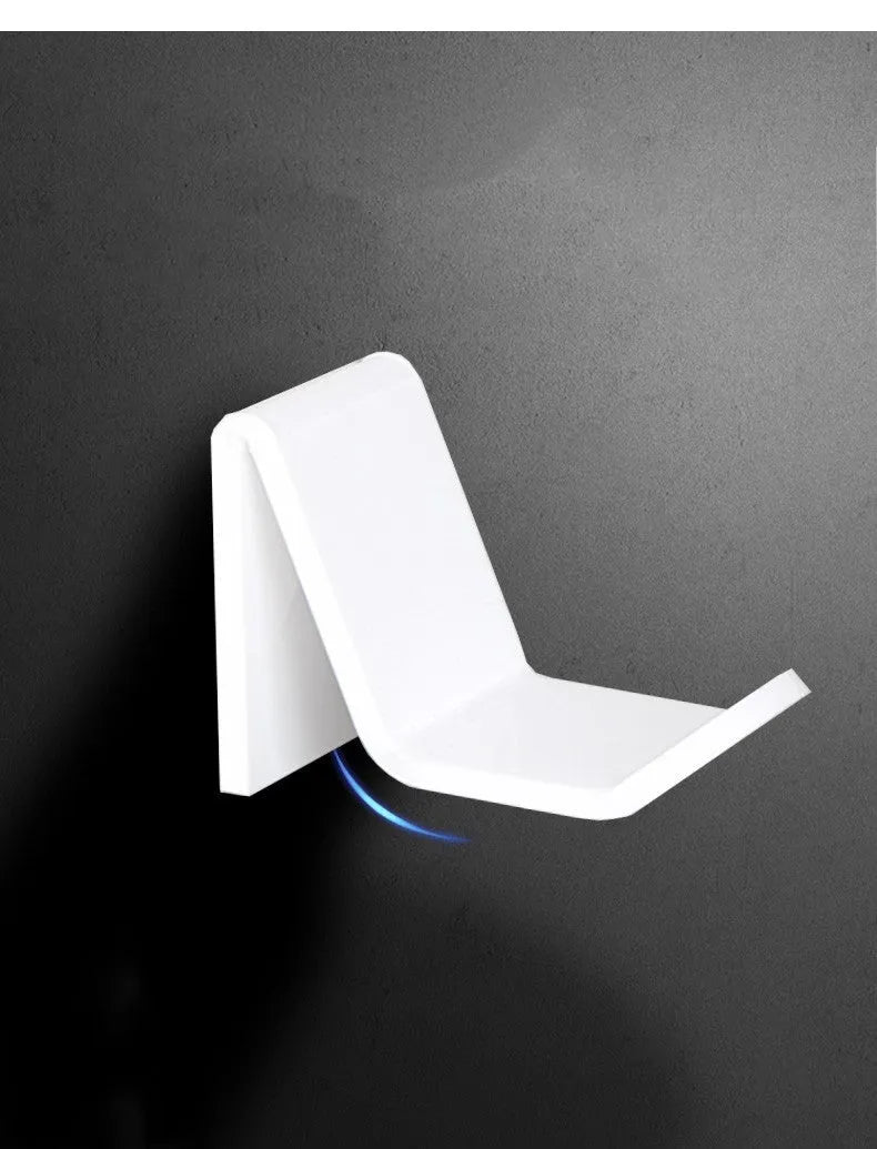 A universal game controller mounting bracket in a choice of black, white, or transparent colours.