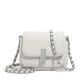 Soft PU leather women's crossbody shoulder bag in black, shown with a phone in the interior pocket.