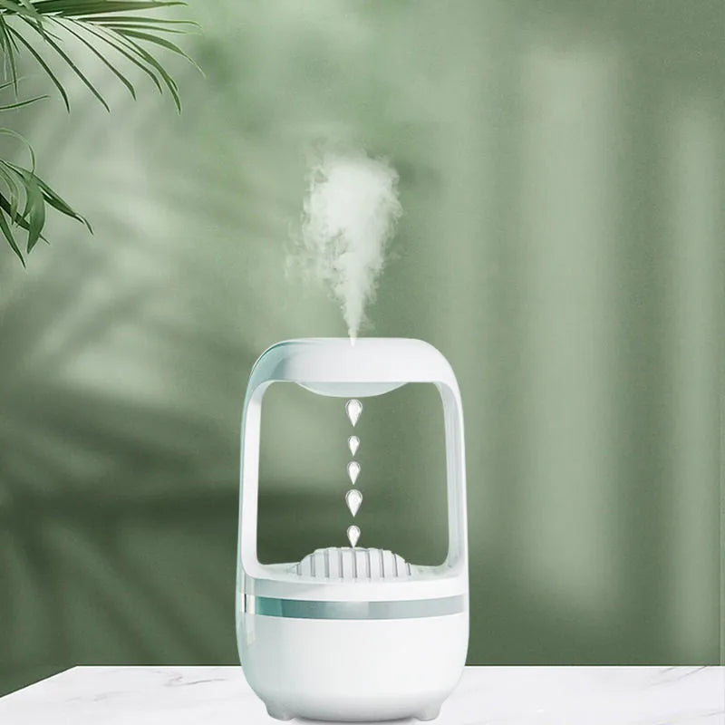 Black and white anti-gravity humidifier showing water droplet effect with USB cable