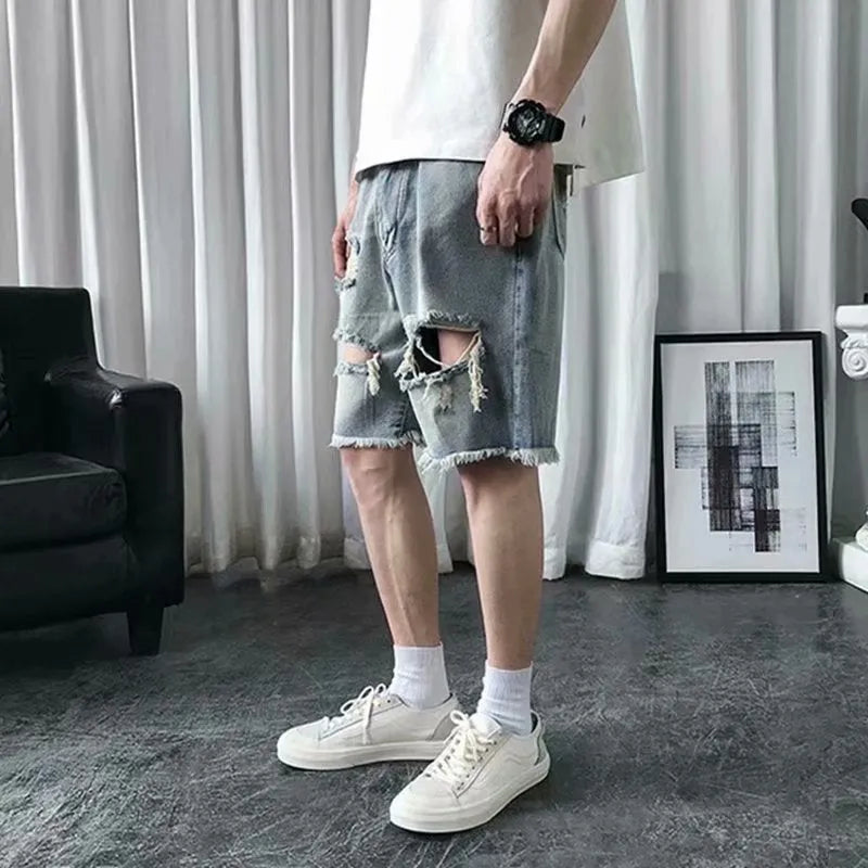 Men's thin ripped denim shorts in retro colour with handmade distressing, Bermuda length, size L