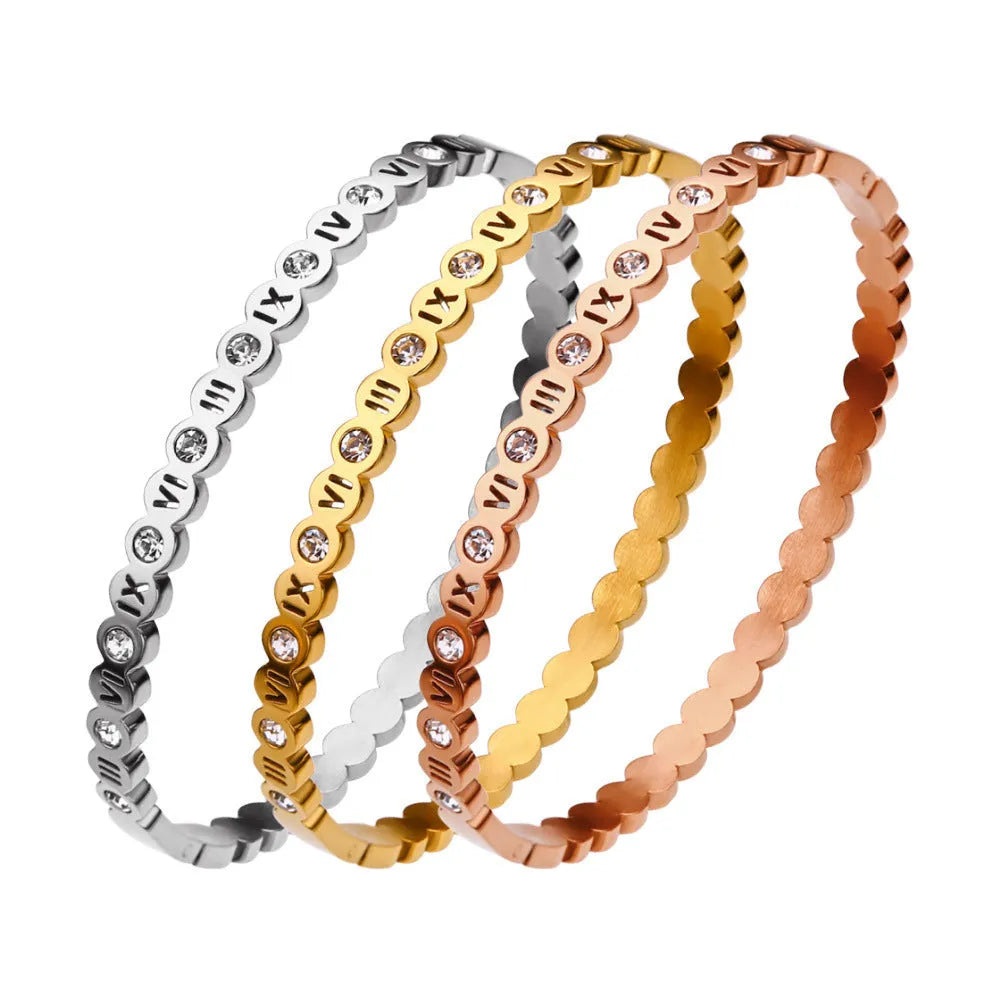 Titanium steel Korean style bracelet with numeric elements in gold, rose gold, or steel colour.