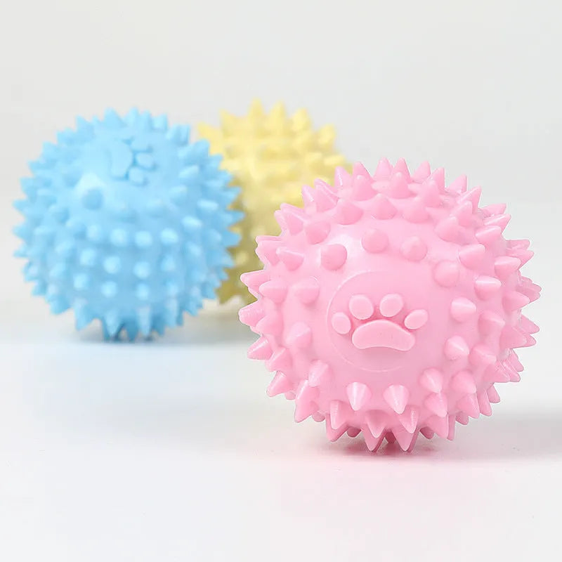 6cm TPR dog chewing ball with textured footprint surface in blue, pink and yellow colour options