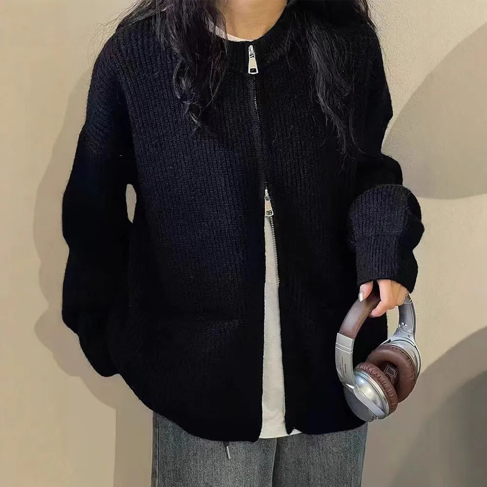 Beige viscose soft sweater coat cardigan with long sleeves on a hanger