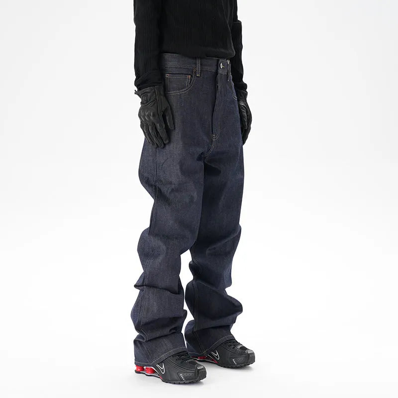 Man's dark blue loose straight-leg casual jeans on a white background.