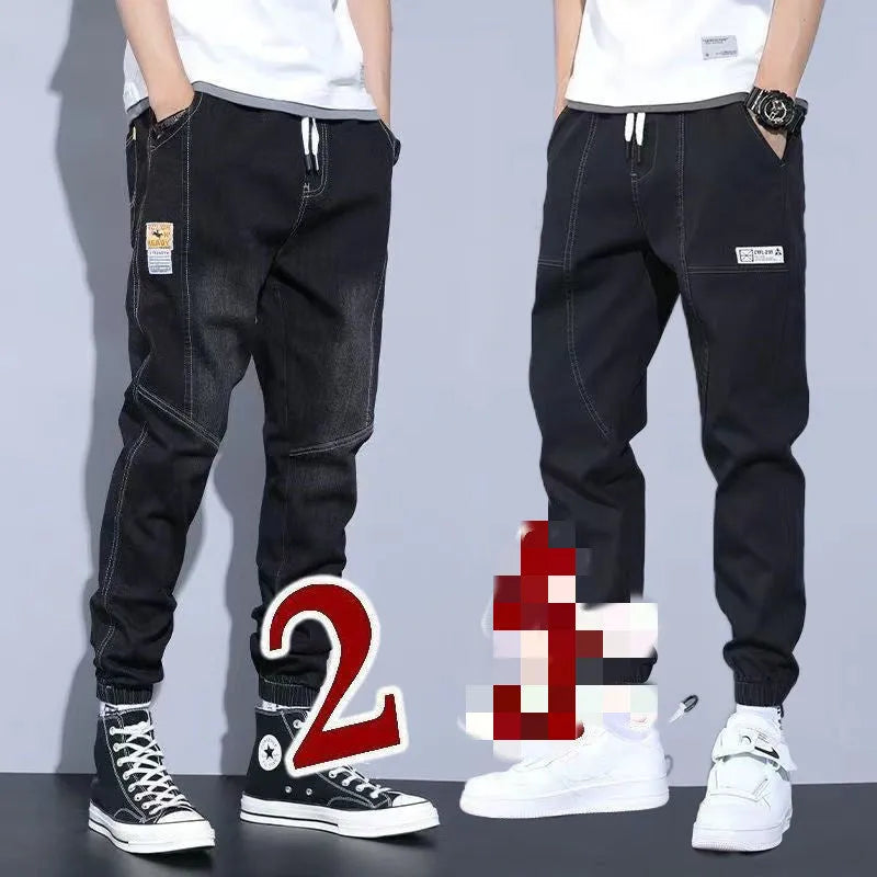 Two pairs of women's casual cotton jeans with mid waist and washed finish in grey and black