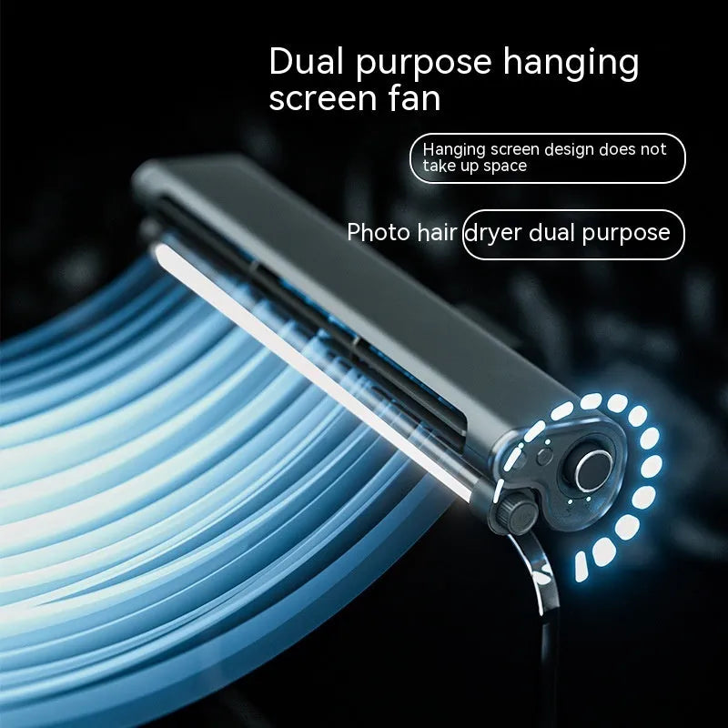 Black USB-powered bladeless fan with an LED lamp, shown clipped to the top of a computer monitor.