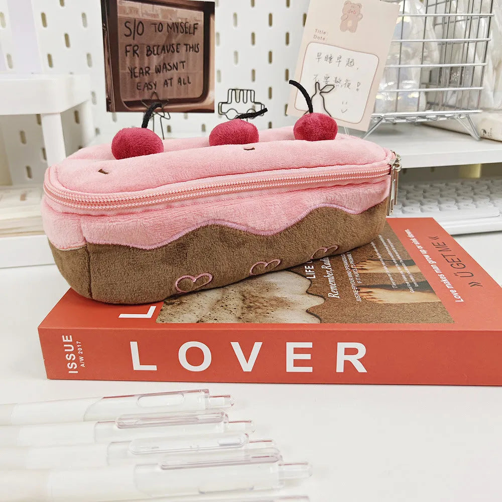 Cherry cake pattern plush velvet pencil case with a zip closure.
