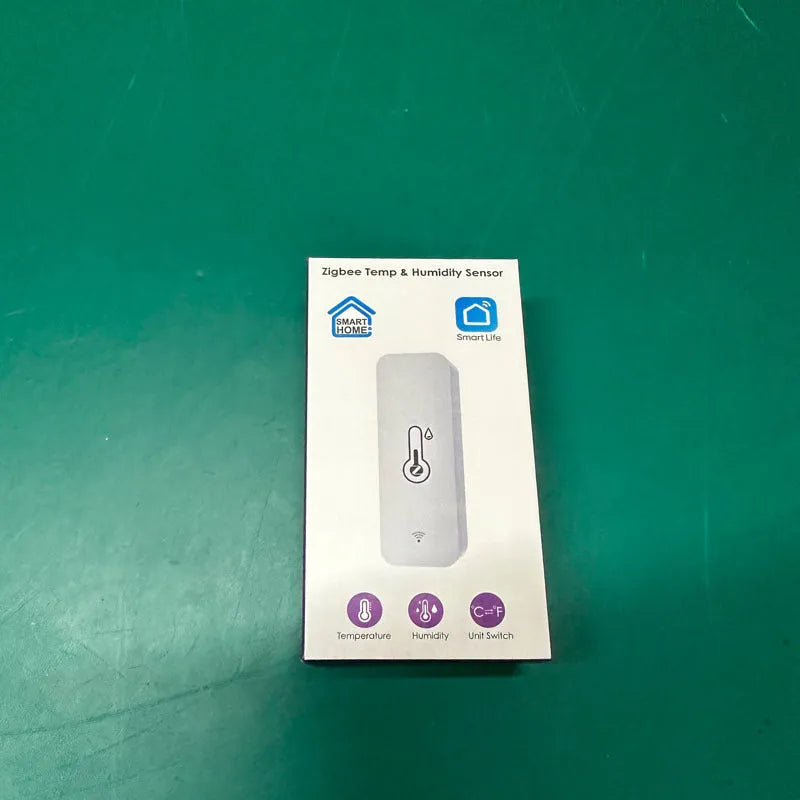 WiFi and Zigbee temperature humidity sensor in ABS plastic case measuring 72mm