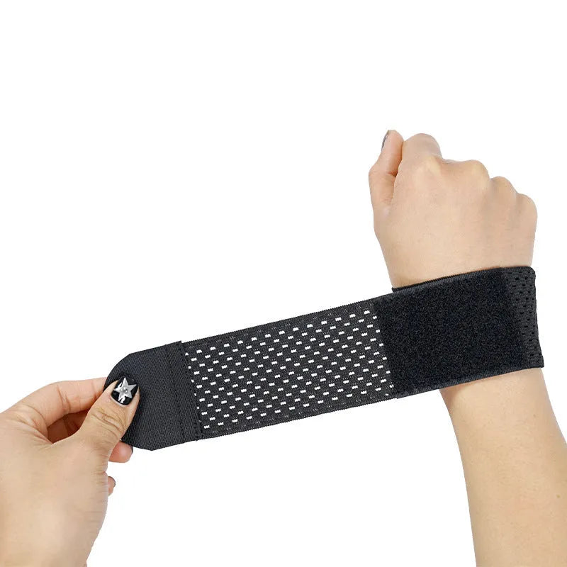 A black elastic breathable wrist guard for athletic sports and gym workouts.