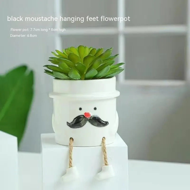 Ceramic hanging foot flowerpot in a cartoon style, shown as a desktop planter for succulent plants.