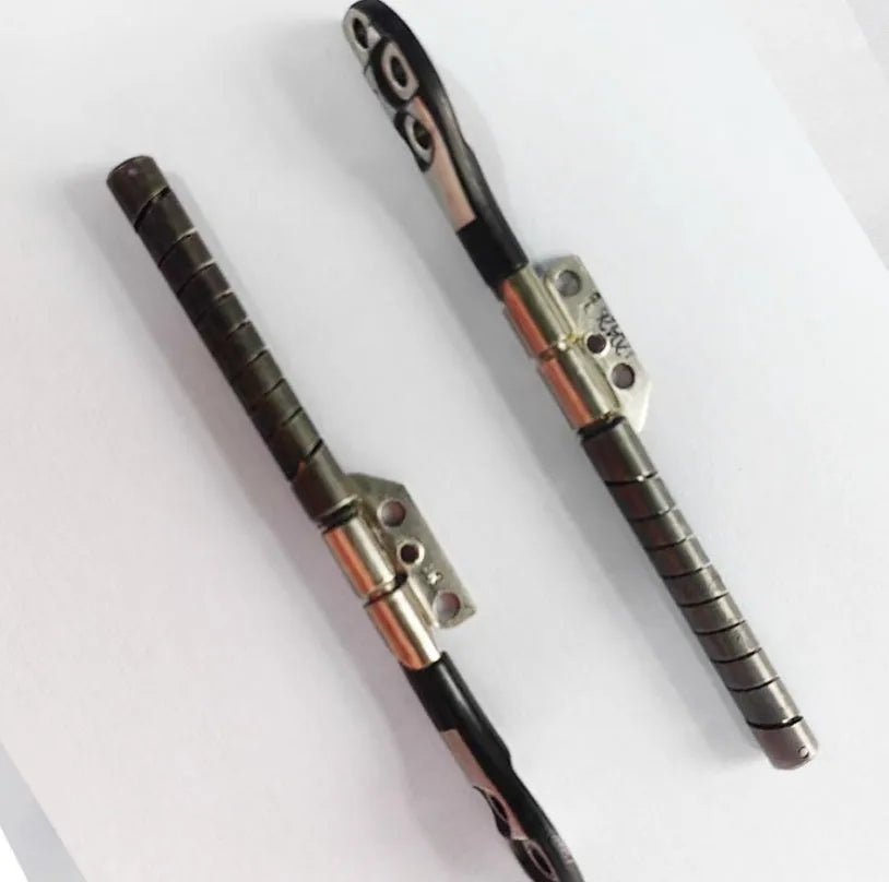 MacBook Pro 15-inch A1286 laptop screen hinge shaft replacement part on foam packaging.