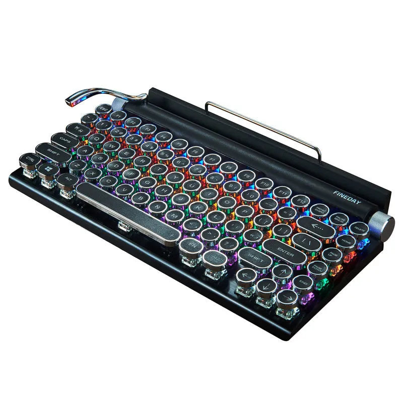 Black retro typewriter mechanical keyboard with backlit keys on a desk